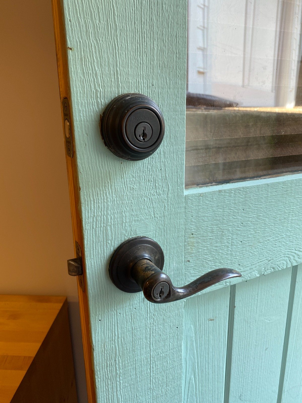 Residential deadbolt teal door