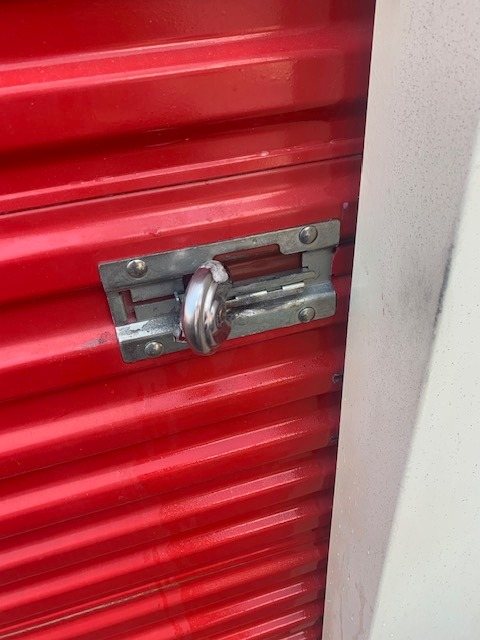 Storage unit hasp